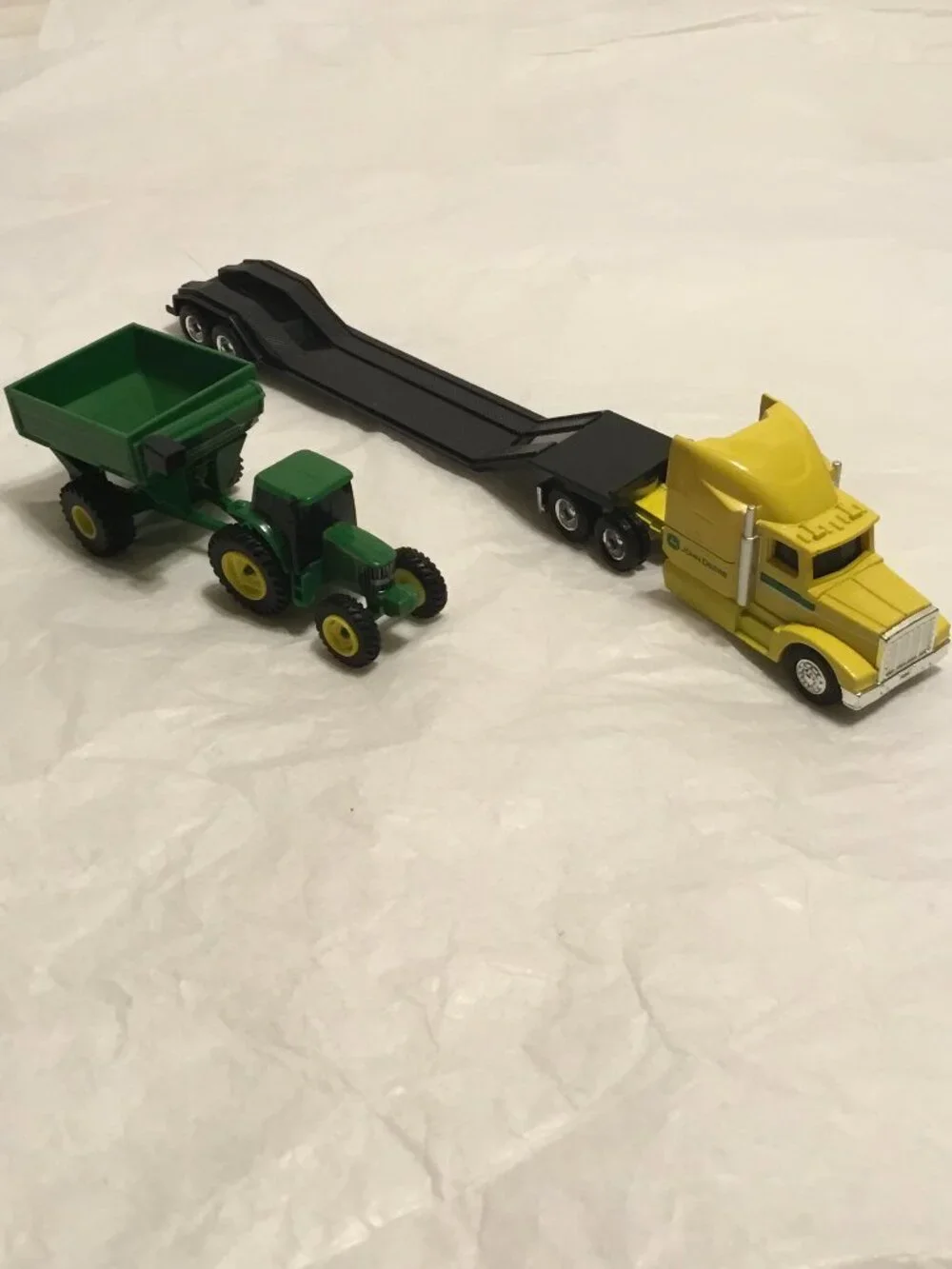Vintage die cast John Deere tractor trailer and trailer w/ tractor and grain bin
